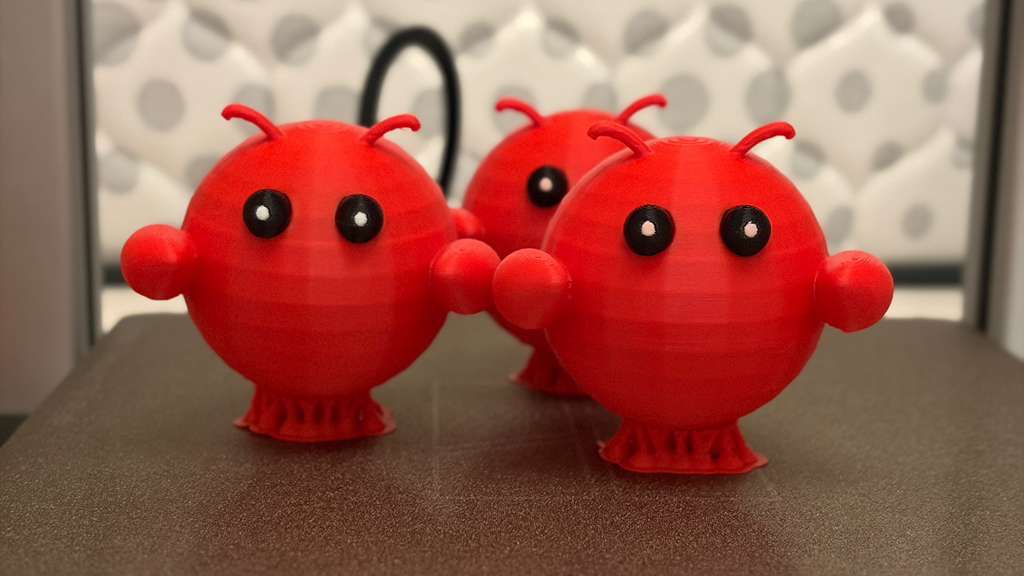 3D-printed OpenClaw mascots - cute red crab-like characters