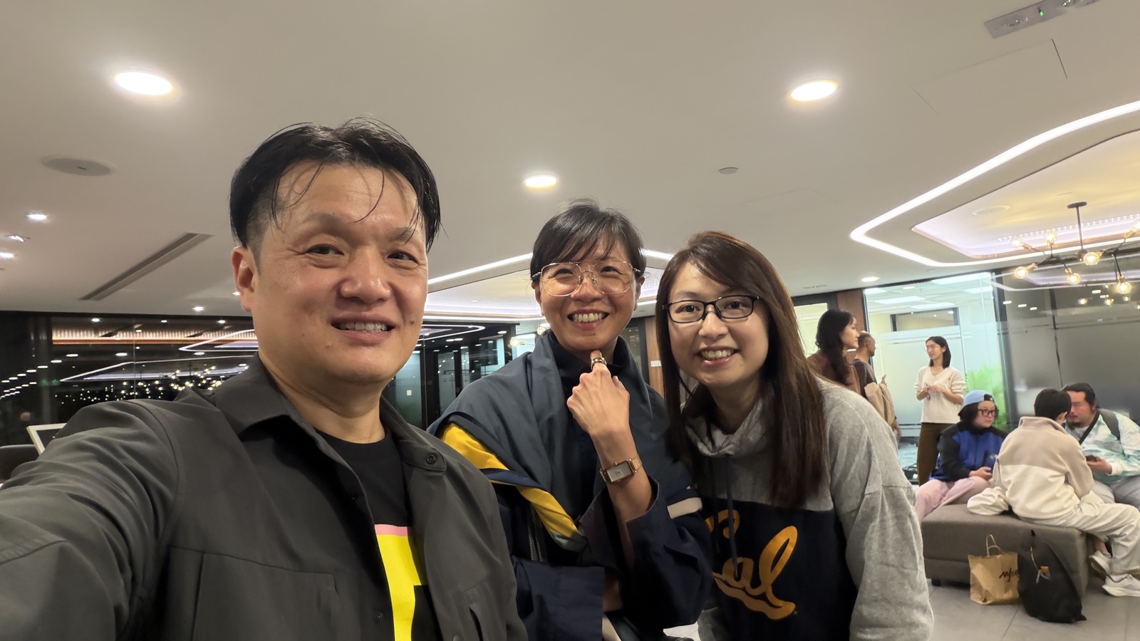 Group selfie with attendees post-event