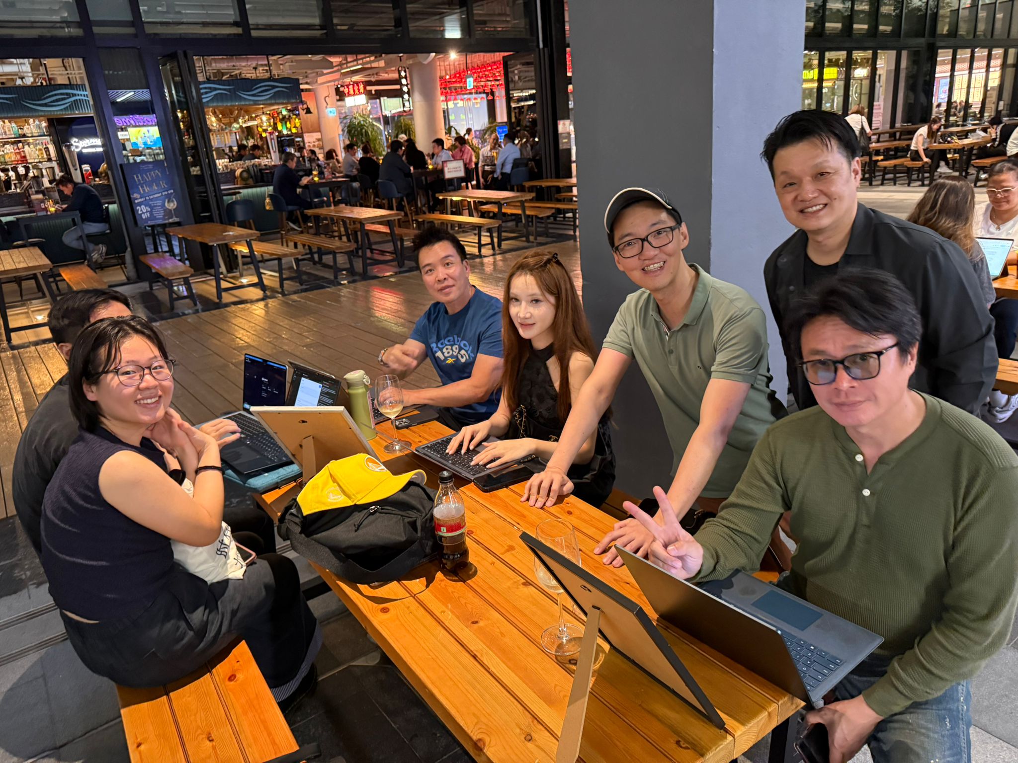 Smaller group smiling at the table