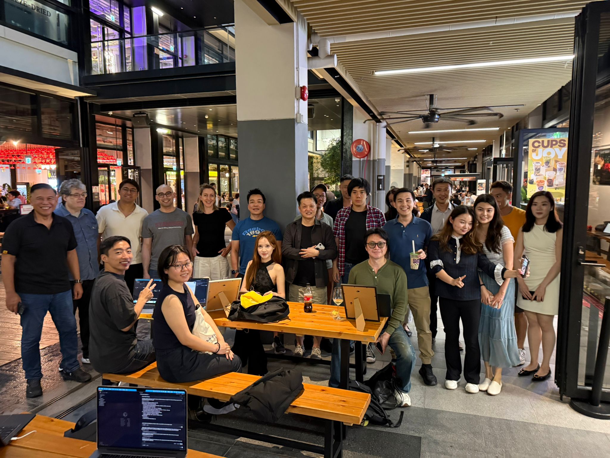 Builders spread across Central Market with laptops open